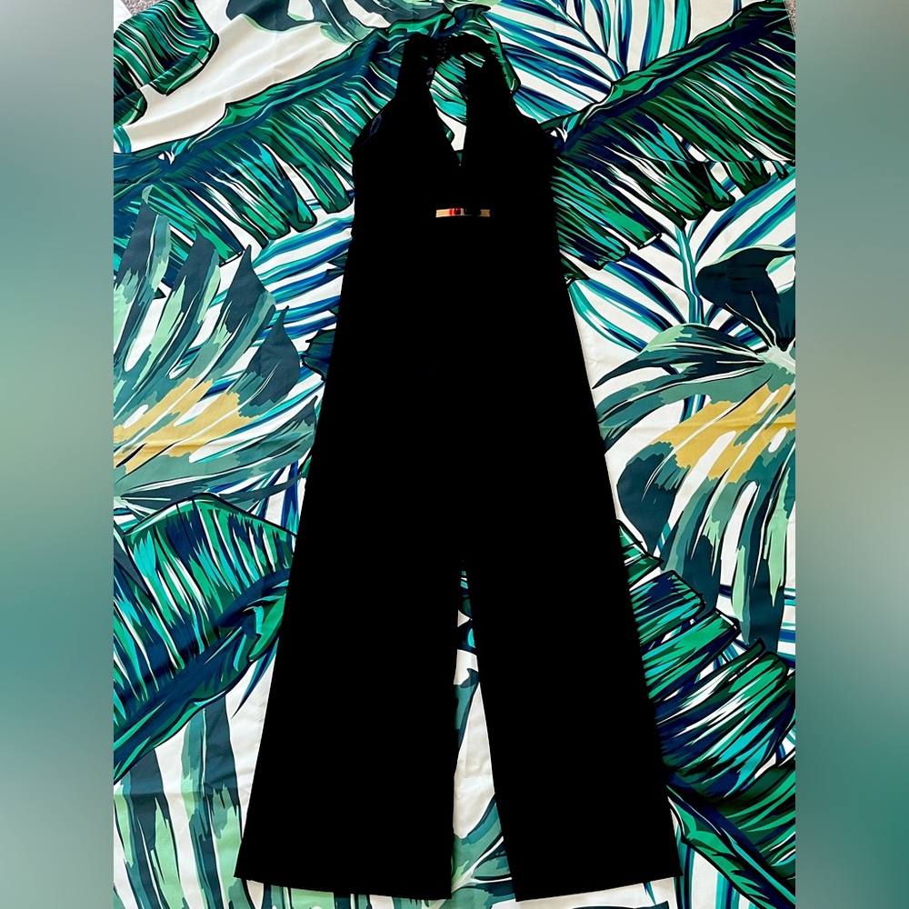 Black Bebe jumpsuit with a halter backing.